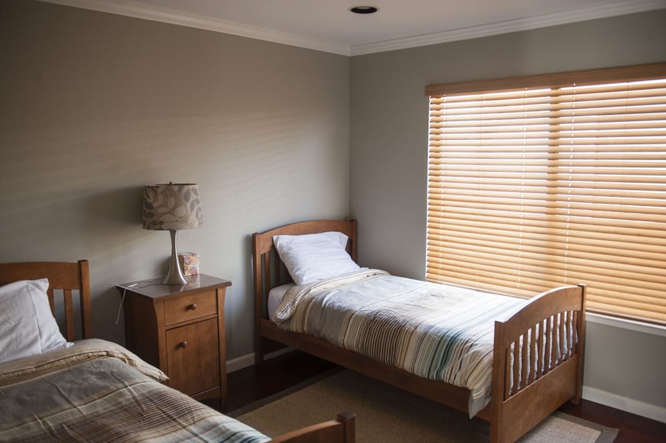Third Bedroom with Twin Beds, Walk-in Closet and Dresser