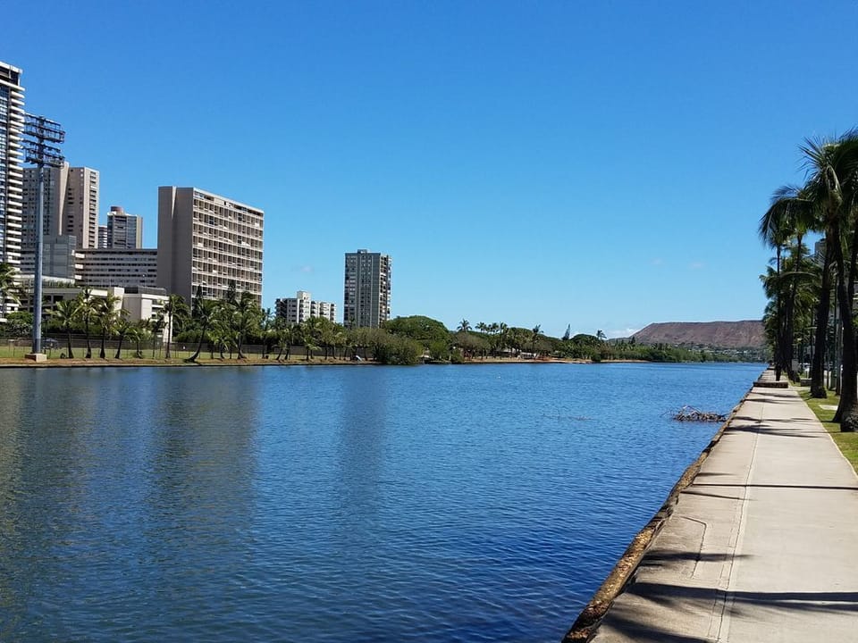 Canal walkway for jogging and walking outside building