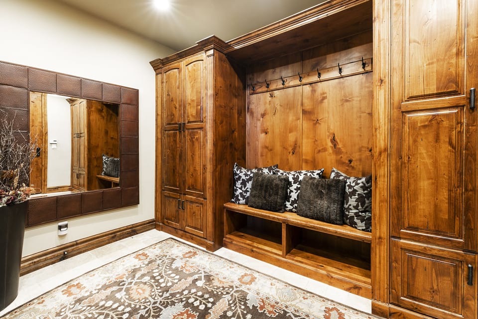 Ski/snowboard, gear lockers next to garage, more lockers than pictured