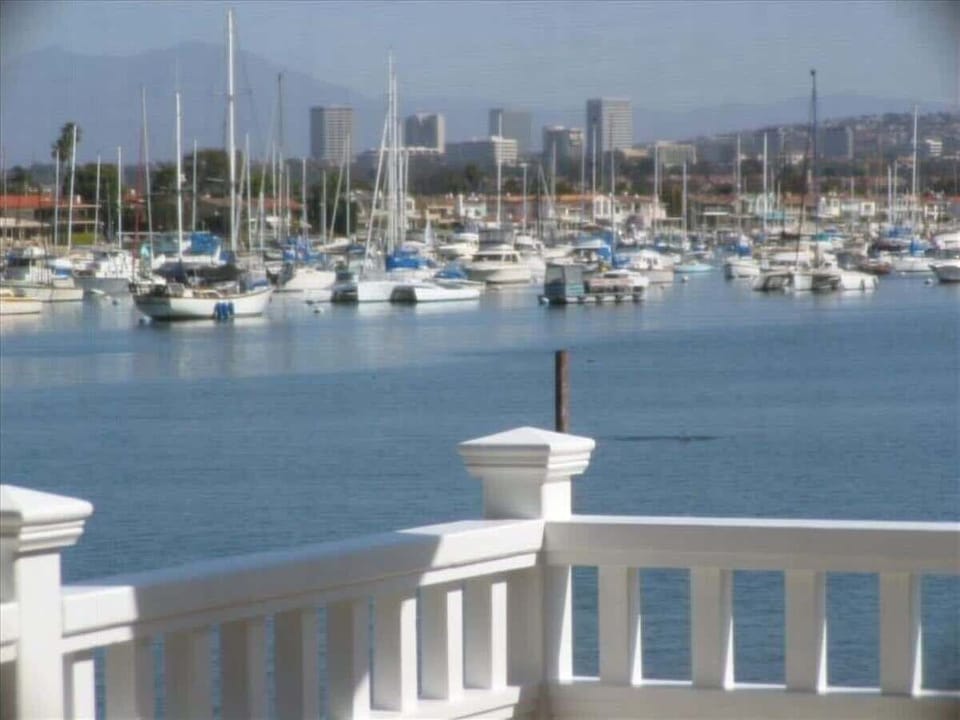 BAY AND BEACH VIEWS FROM GREAT ROOM AND MAIN BEDROOM