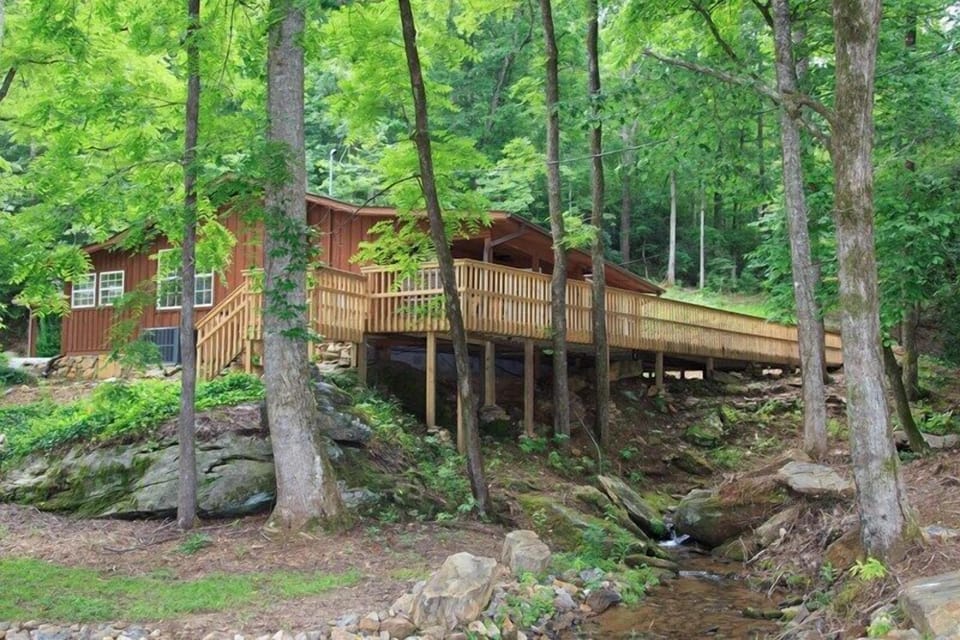 View of home and large deck