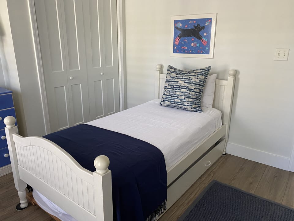 Upstairs bedroom with trundle bed.