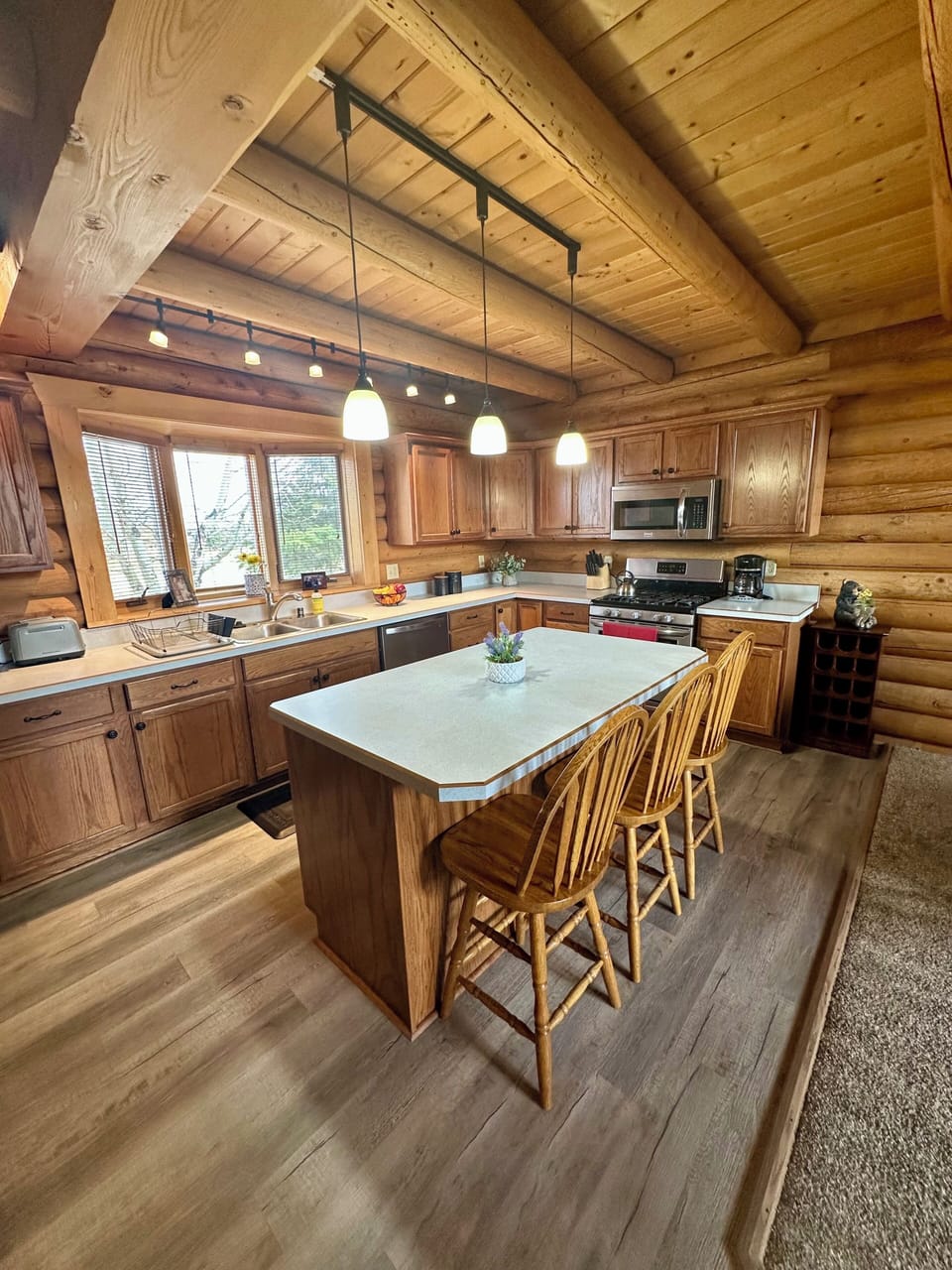 Large kitchen equipped with everything you need to prepare your meals, gas range