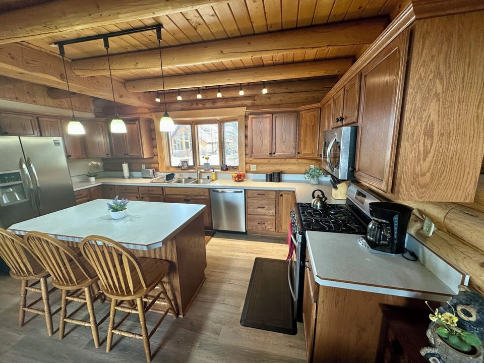 Stainless steel appliances in the kitchen with ample counter space