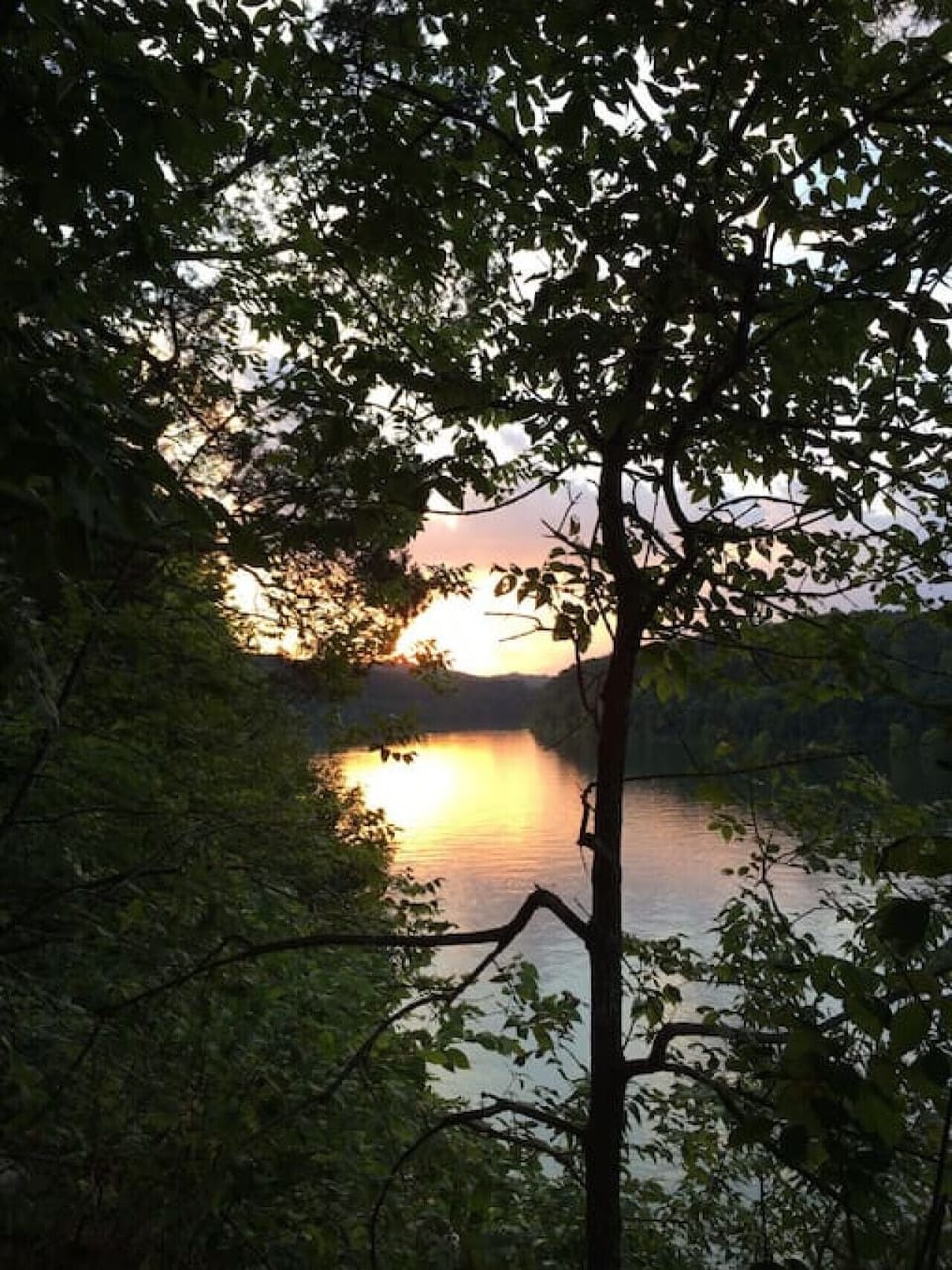 Sunset from the side covered porch over looking Lake Cumberland.