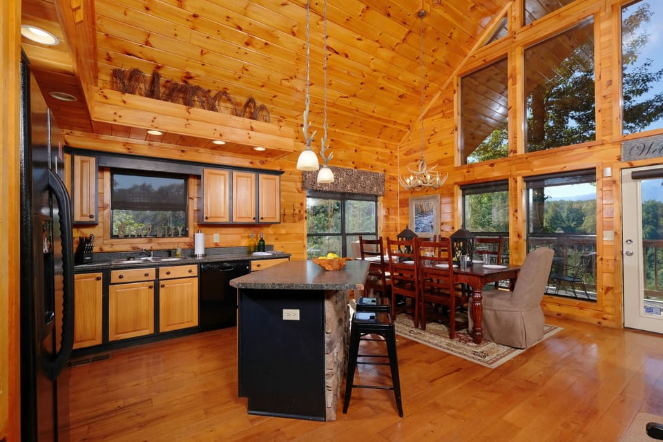 Full kitchen along with 8-person dining room table