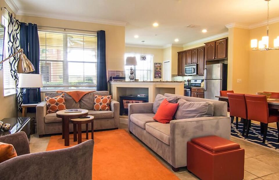 Very spacious  bright living dining space with 70 in TV, DVD player, speaker