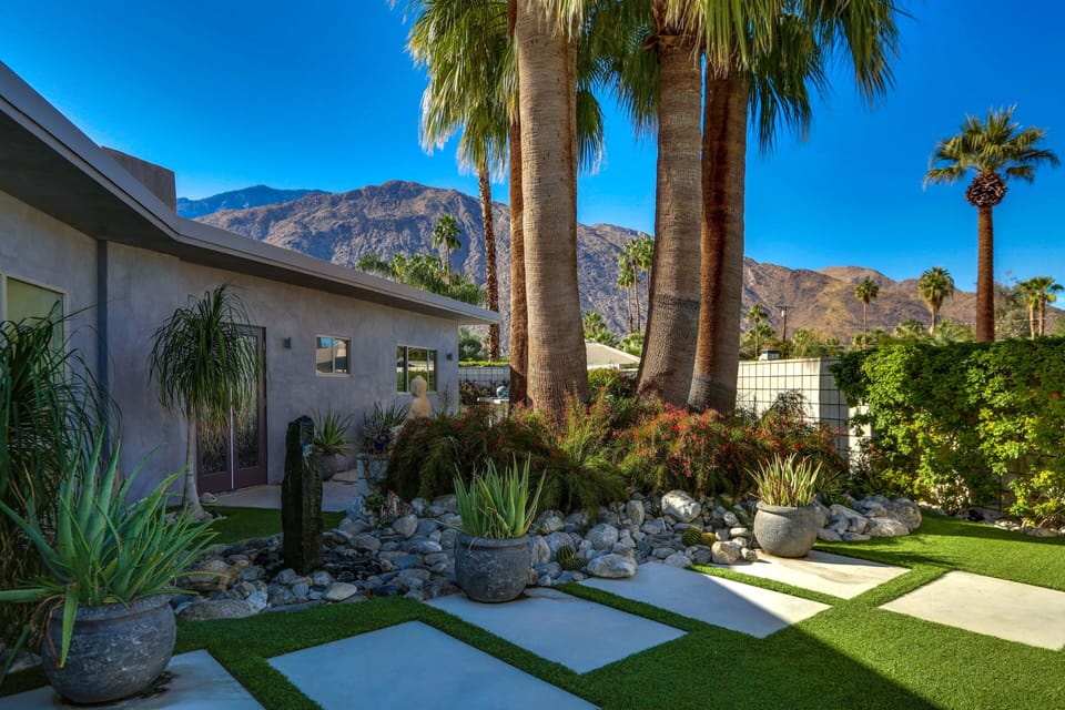 Front courtyard Zen garden, entire property is walled, gated and hedged