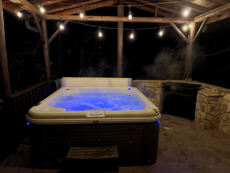 Unwind in the hot tub after a day of exploring
