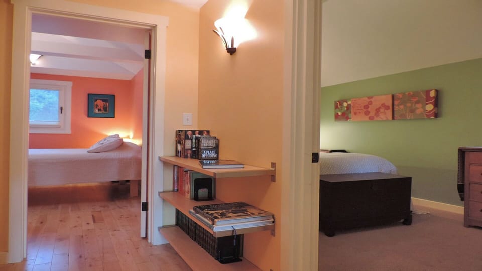 View from hallway into bedroom 1 and 2.