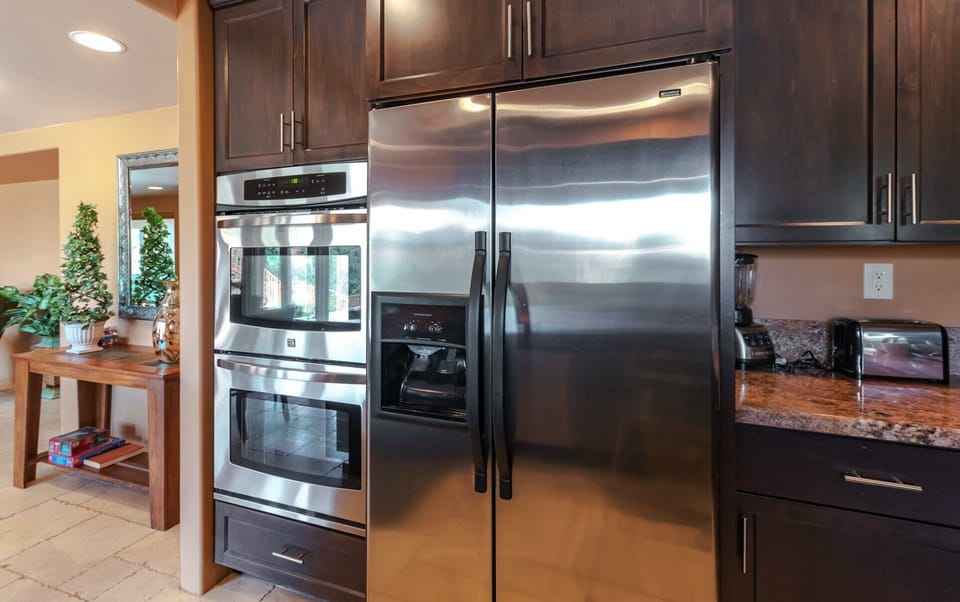 The Tuscan Suite #3 full sized stainless steel appliances. 