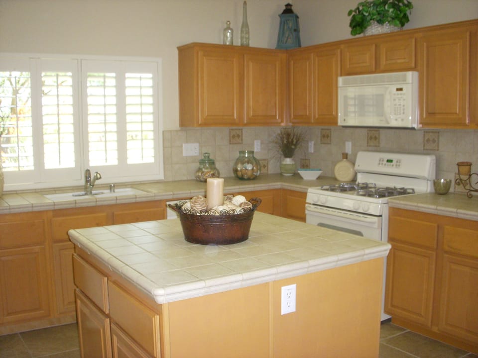 Kitchen with Stove and Microwave.  Cooking Island.