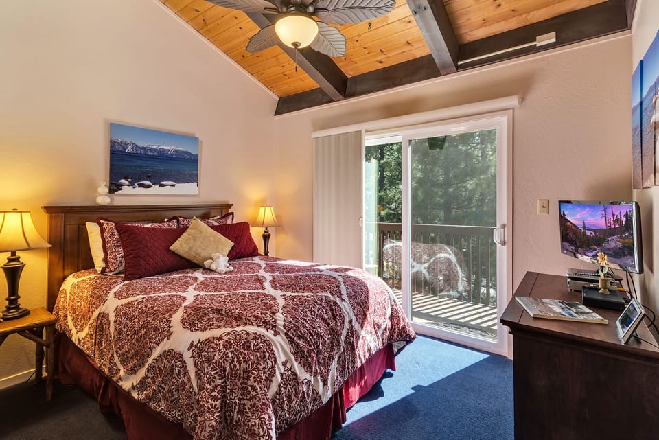 3rd level master queen bedroom with deck and flat screen tv