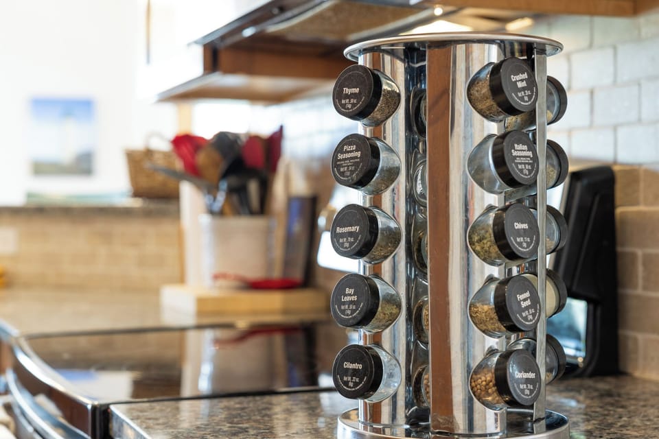 Fully stocked kitchen with spices and condiments 