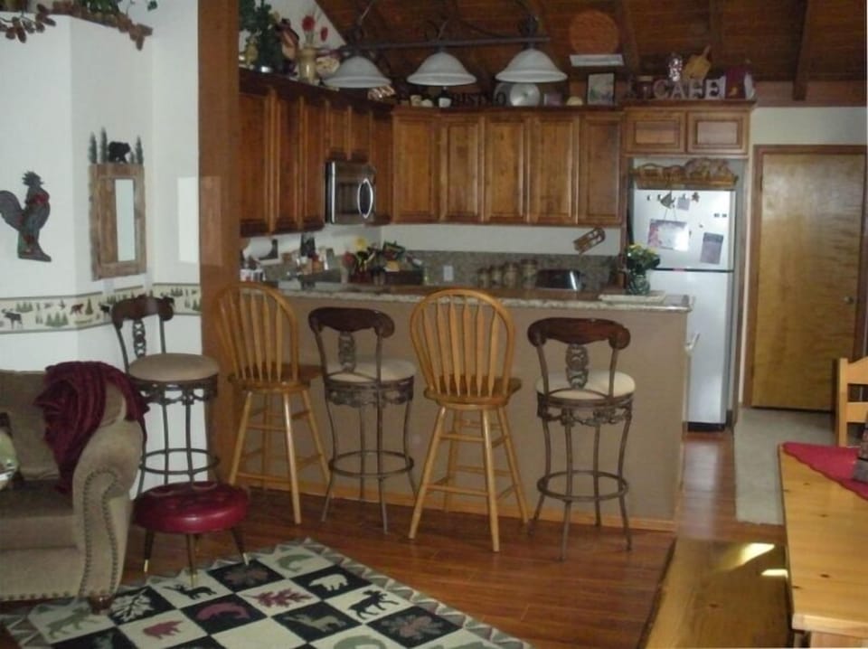 Dining room seats 8
 at table, kitchen bar seats 5!