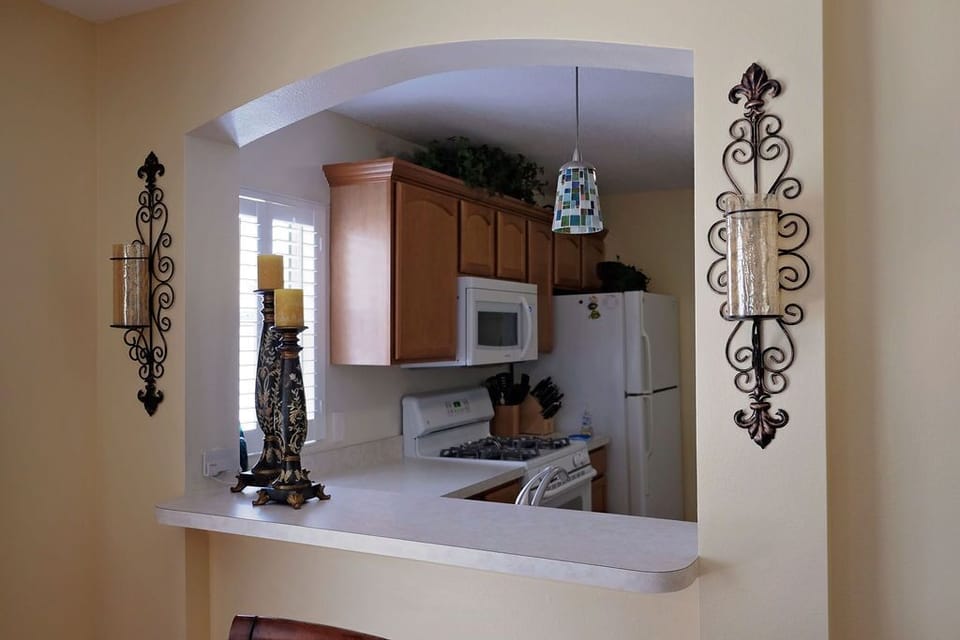 Dining to Kitchen pass through for easy conversation.