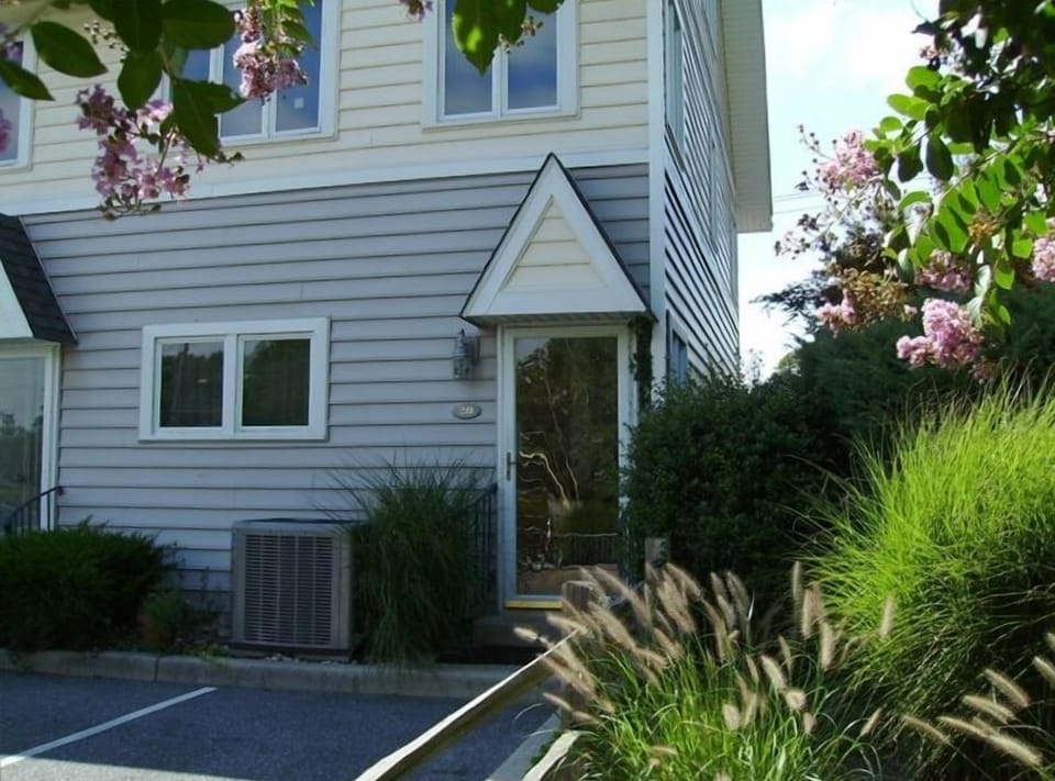 End unit townhouse with lots windows and two dedicated parking spaces!