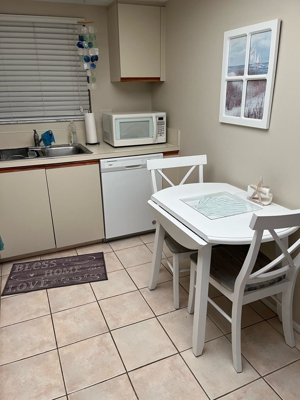 Fully equipped kitchen including a coffee maker and it’s own TV. 