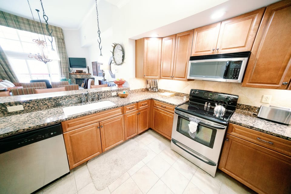 Dishwasher, Oven, Cooktop, And  Microwave