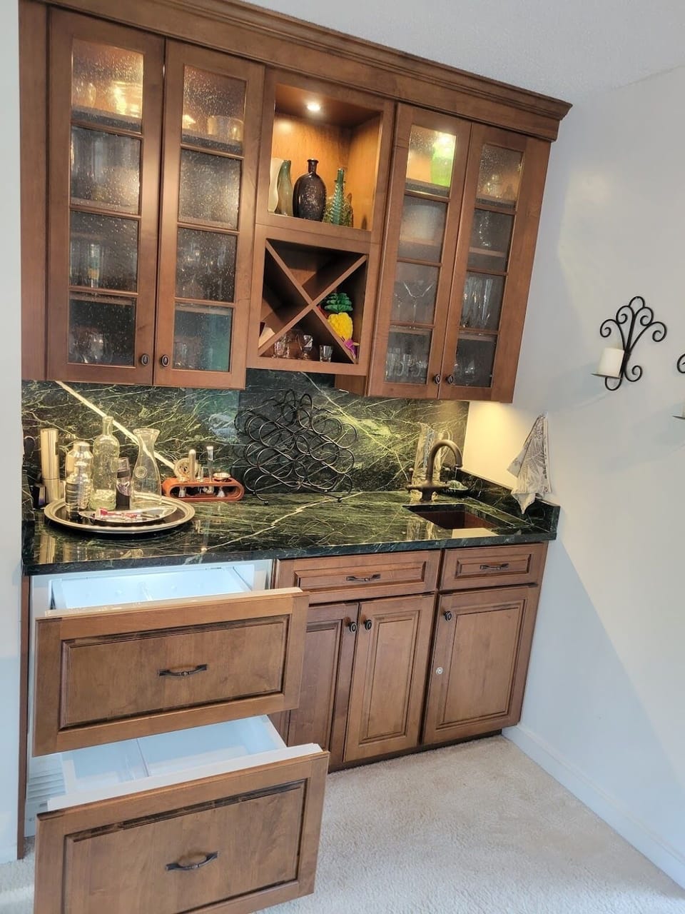 Sub-Zero refrigerated drawers for your beverages, and nice glassware above! 