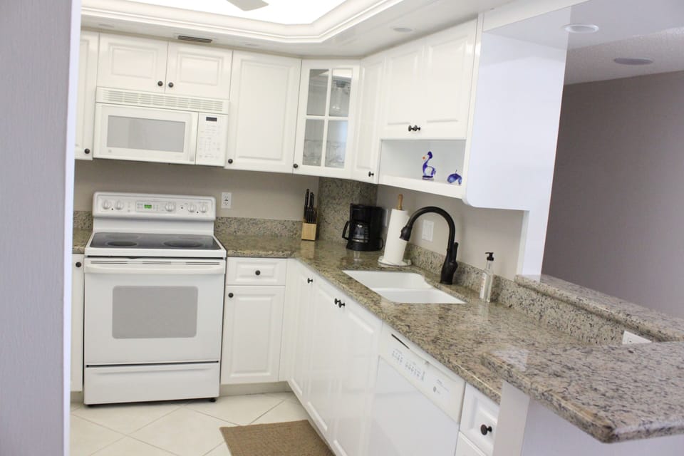 Bright, clean and comfortable.  Kitchen has same beautiful view of beach & gulf!