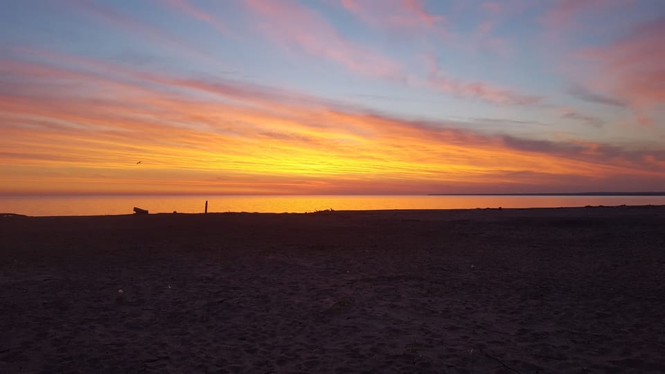 Big sandy beach. The sunrises are amazing!
