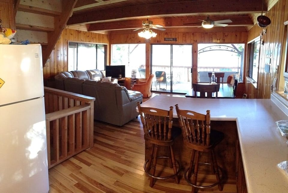 View from kitchen to living room, dining room & Deck
