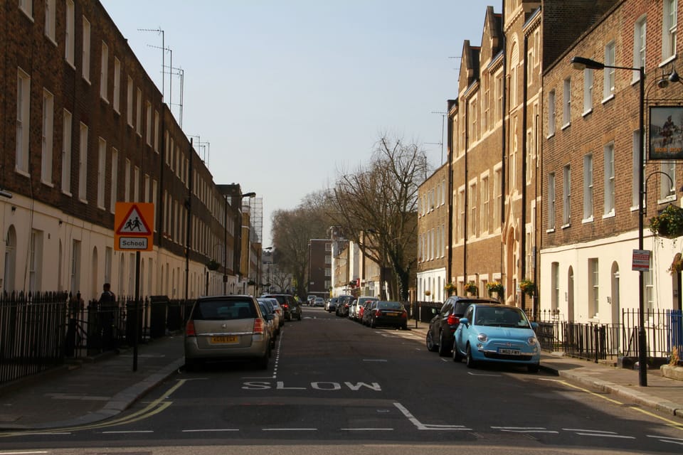 The apartment is located on a quiet residential street...