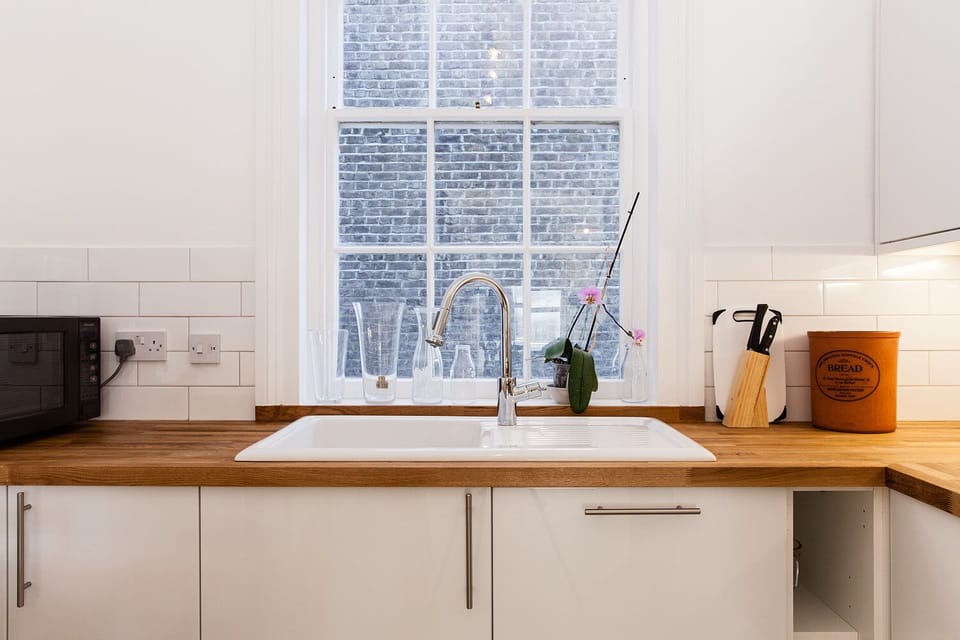 The kitchen is equipped with a dishwasher, fridge freezer, kettle...