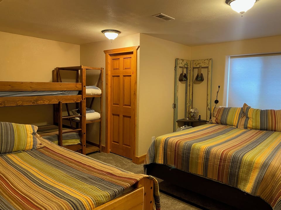 Lower Level Bedroom with Queen & 3 Twins