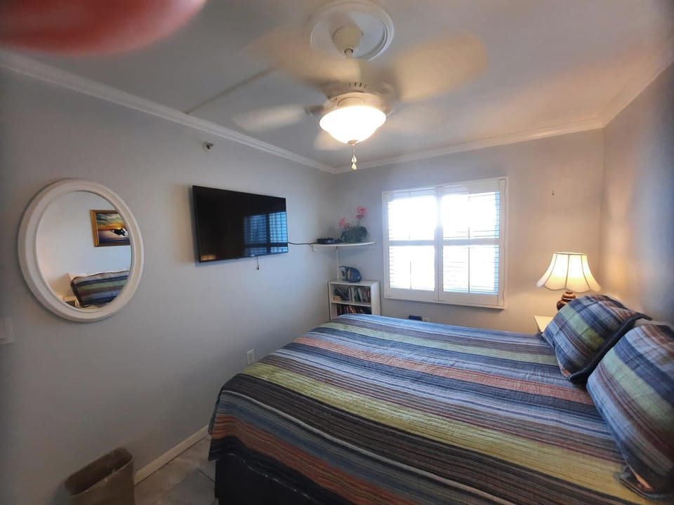 Bedroom 3 queen bed plantation shutters