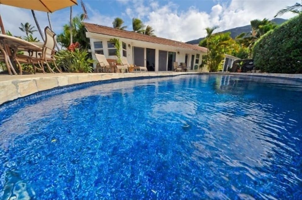 Spa, Pool, Tiki bar, Gas BBQ, Firepit and waters edge beyond