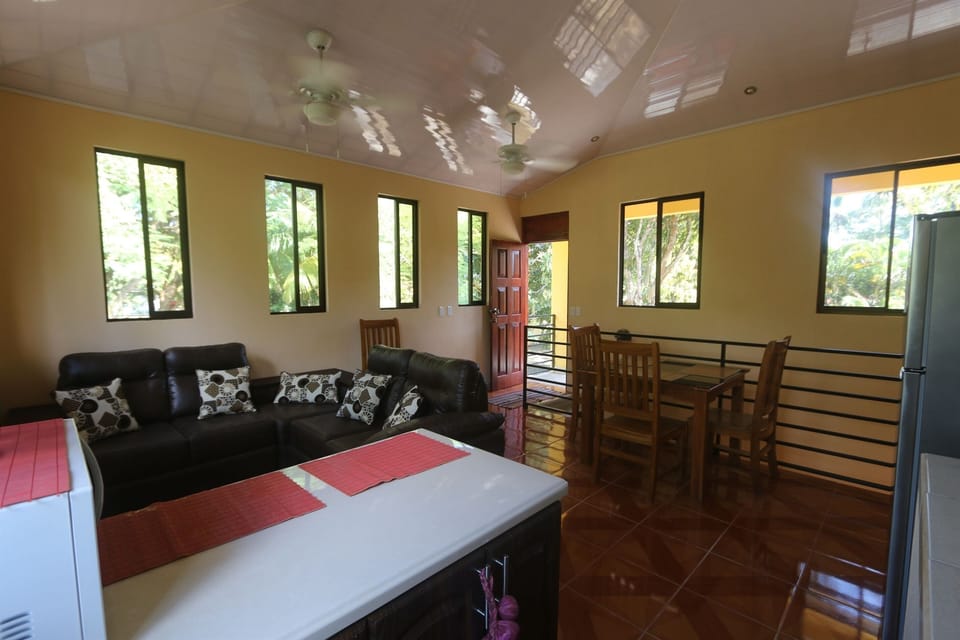 Kitchen/living area of 2 bedroom house, covered balcony