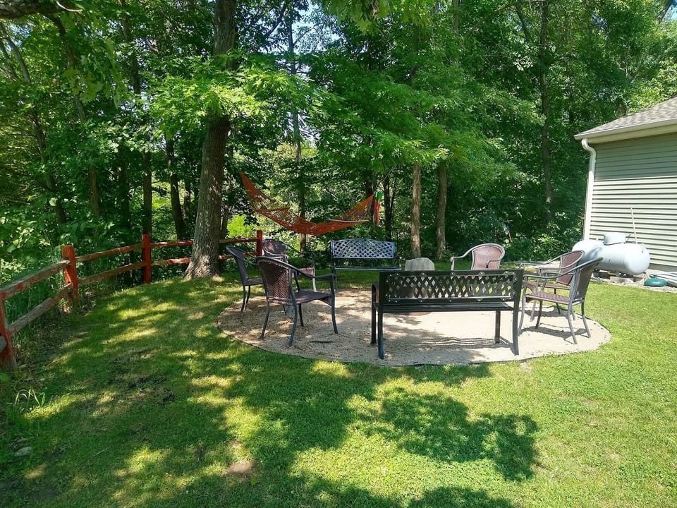 Campfire area with nearby hammock, just steps from the house