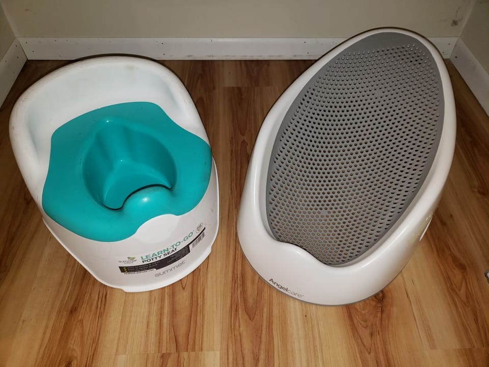 Toddler potty chair and infant bath support available for use