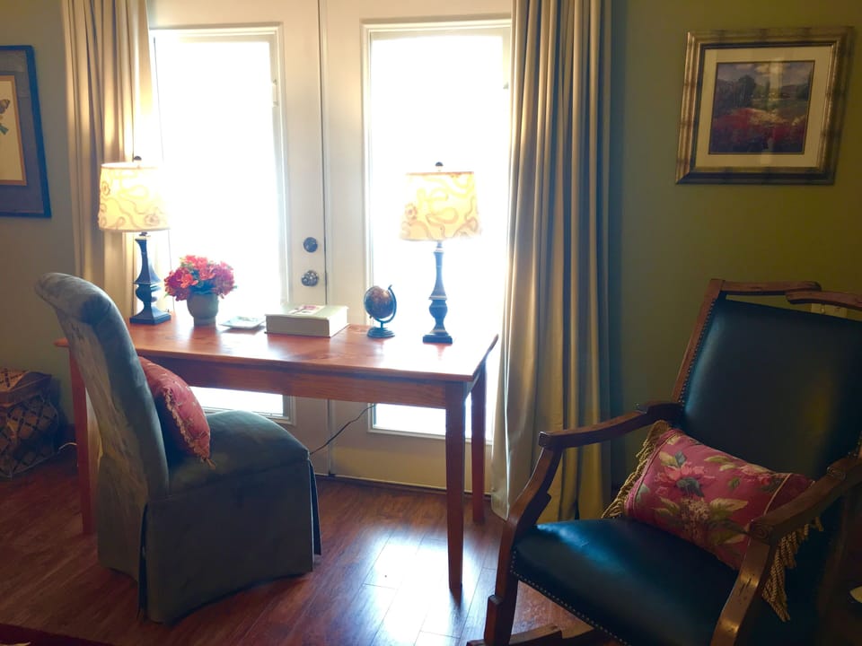 The writing desk and rocker in the master suite.
