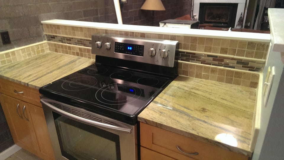 Granite Counter, Full appliances and cookware, open to dining and living room