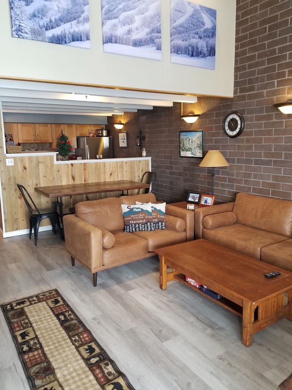 Large dining room table and open to kitchen.  