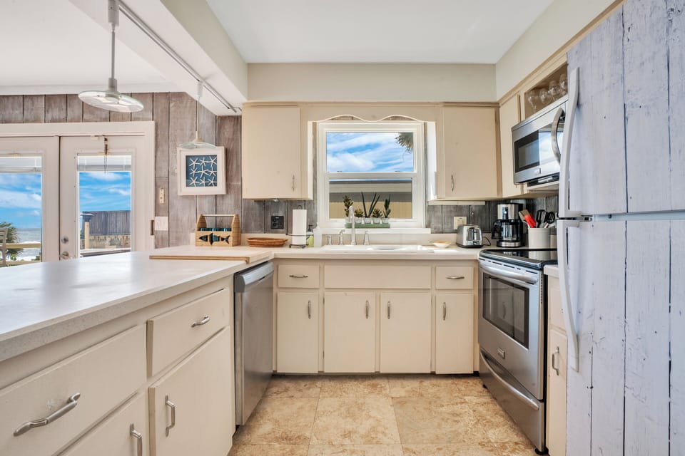 Well appointed kitchen.  Prepare a meal while you watch the dolphins swim by.