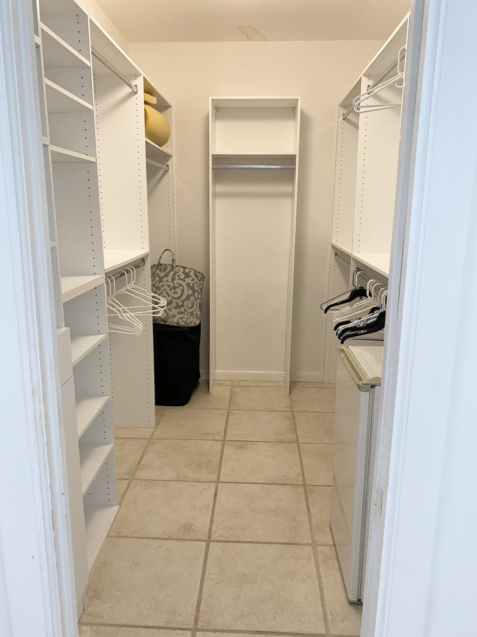 Walk in closet with private refrigerator 