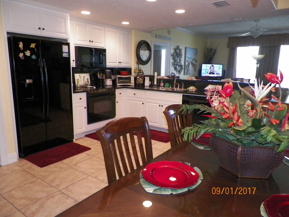 VIEW OF DINING ,KITCHEN & GREAT ROOM