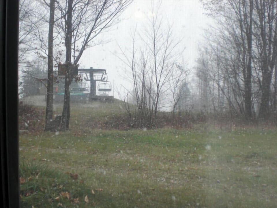 1st snowfall in Oct!  Viewed from the living rm window, slopes & chair ahead...