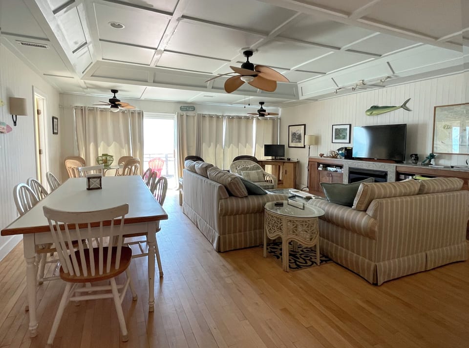Dining table for 8. + Smaller glass table for 4. + kitchen island seating for 4