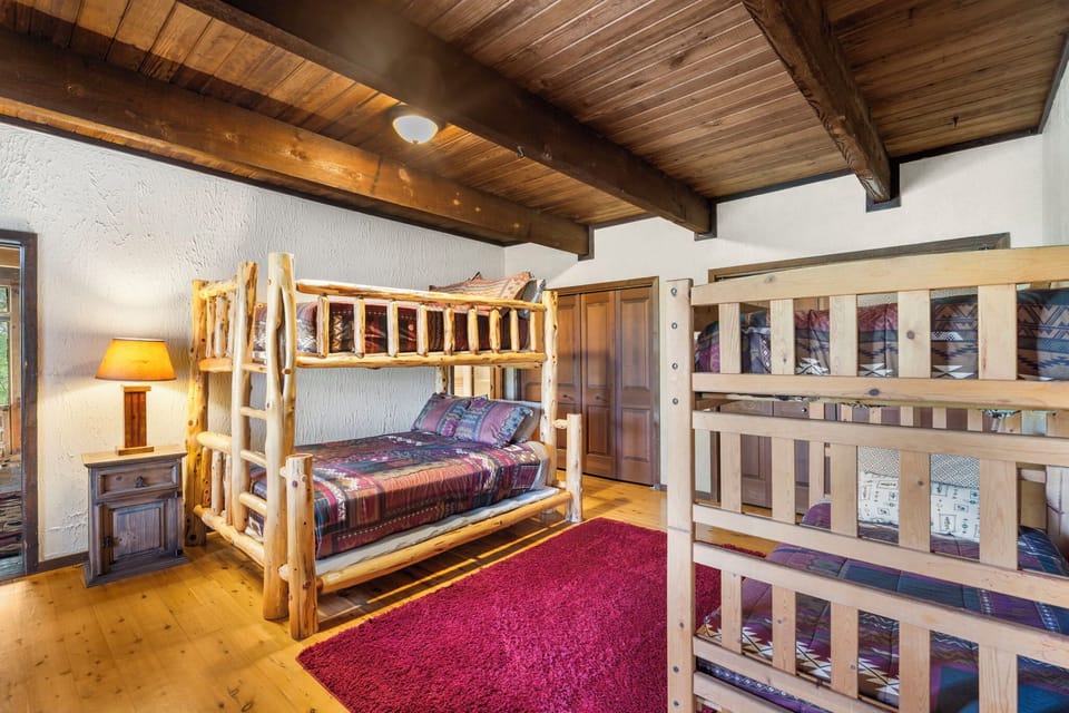 The Bunk room. Full over queen log bunk and twin over twin bunk. Sleeps 6 kids!