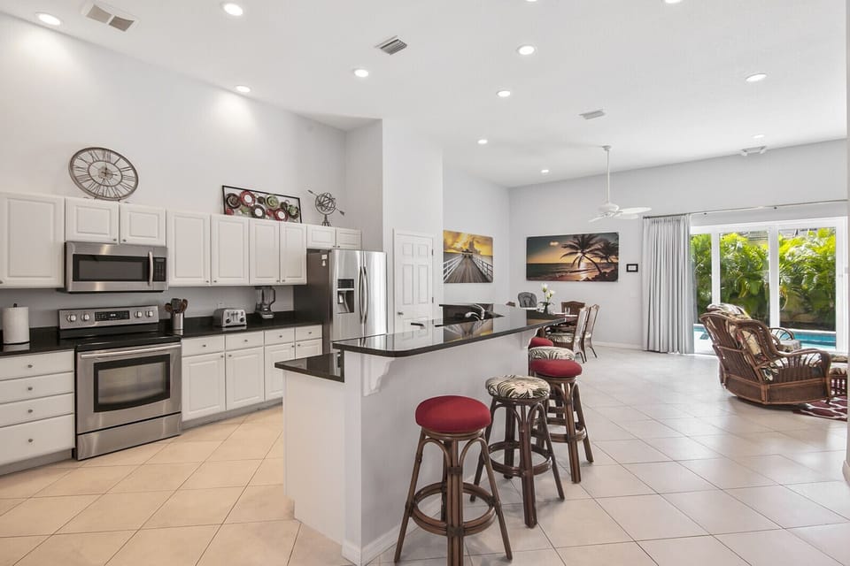 Open Concept Downstairs Kitchen, Dining, Lounge