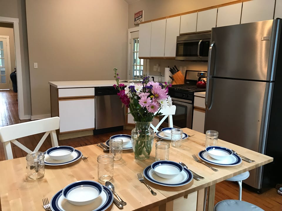 Open kitchen with expandable dining table (seating for 6). 