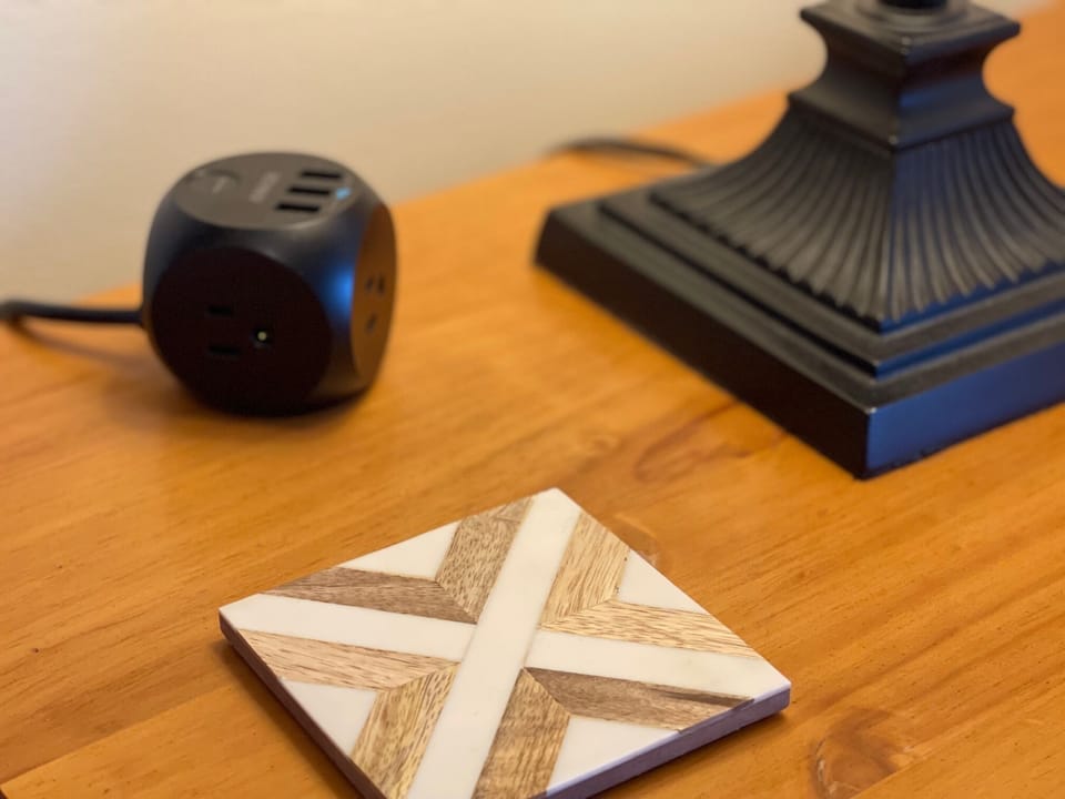 Each bedroom has its own USB and plug device charging station.