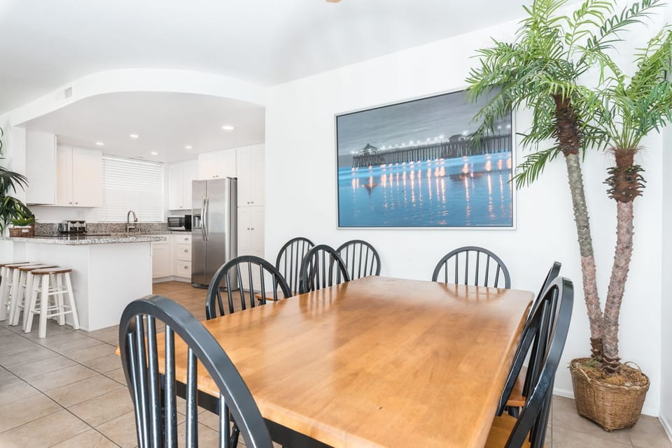Dining area, adjacent to both kitchen and living areas, is the perfect headquarters for family meals, game night and good conversation.
                