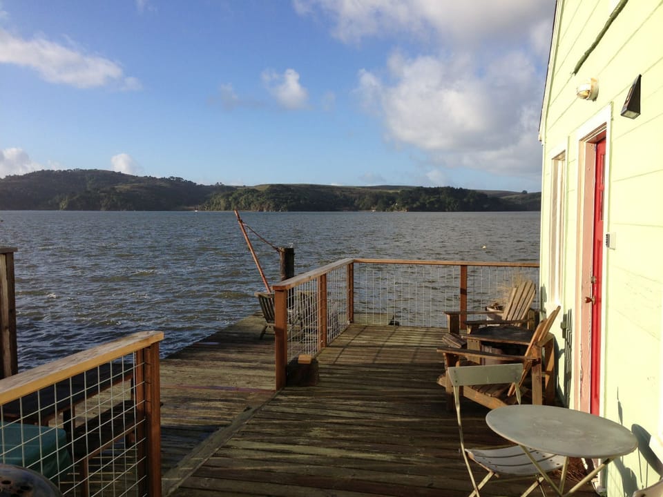 South facing deck with doc feels like summer during winter and blocks the breeze