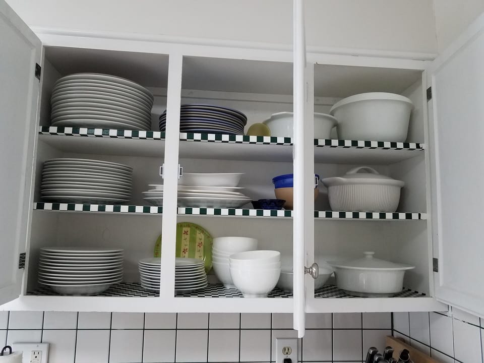 plenty of dishes, glasses, etc.
